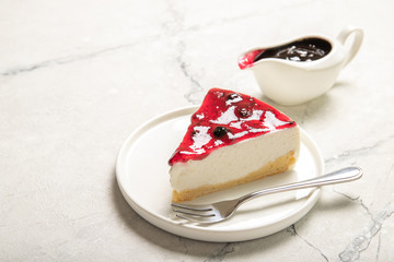 Cheesecake with jam on the table