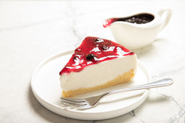 Cheesecake with jam on the table