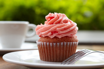 cherry cupcake with fork