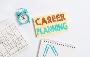 Writing note showing Career Planning. Business concept for Strategically plan your career goals and work success Keyboard with empty note paper and pencil white background