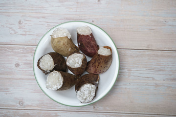 Glutinous rice steamed cooked with coconut milk in pitcher plants known as lemang periuk kera is a traditional malay  food famous during Eidul Fitri festive and rarely to find. Selective focus.