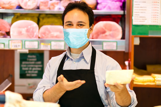 Grocery Storekeeper Wearing A Mask - Coronavirus Concept