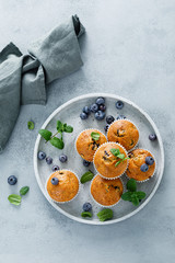 Blueberry banana muffins with fresh berries