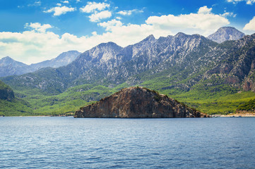 Landscape with the Dalyan island in Turkey. Mouse Island in the Mediterranean Sea. Mountains on the coast of the sea.