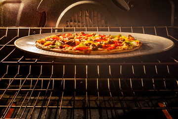 Pizza baking in the oven
