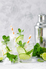 Refreshing summer alcoholic cocktail mojito with ice, fresh mint and lime