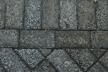 Paving stone texture. texture of the paved tile on the bottom of the street.