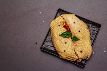 Raw duck breast and spices. Delicious ingredient for cooking healthy meal