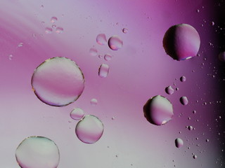 Oil on water abstract background with bubbles