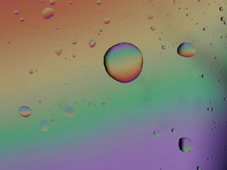Oil on water abstract background with bubbles