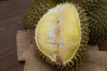 Delicious fresh sweet taste of durian on the wooden table, king of fruits in Thailand