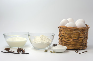 
On a white background are plates with baking products.