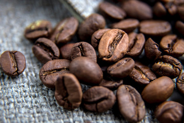 Coffee beans close-up. Beautiful coffee background. Artistic blur.