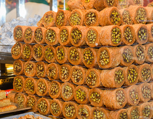 Various types or many colorful assortment of Turkish delights rolls for sale in a shop in Istanbul