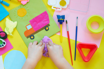School supplies, stationery on yellow background - space for caption. Child ready to draw with...