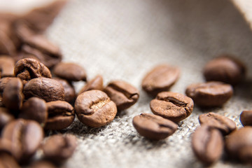 Coffee beans close-up. Beautiful coffee background. Artistic blur.