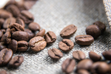 Coffee beans close-up. Beautiful coffee background. Artistic blur.