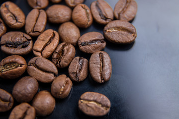 Coffee beans close-up. Beautiful coffee background. Artistic blur.
