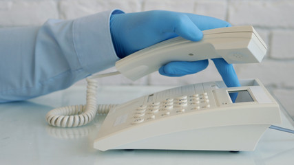 Man Wearing Protection Gloves in Hands Using Telephone Communication, Social Distancing Lifestyle