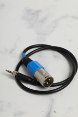 cable audio XLR micro jack male on white background