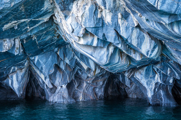 The Marble Caves (Spanish: Cuevas de Marmol ), a series of naturally sculpted caves in the General Carrera Lake in Chile, Patagonia, South America. - obrazy, fototapety, plakaty