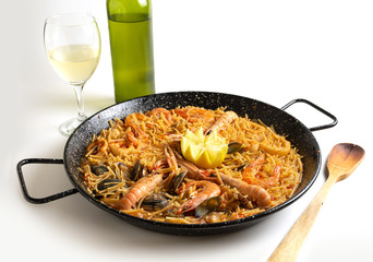 seafood fideua on white background traditional food