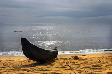 The lonely boat on the coast of ocean. Atlantic ocean