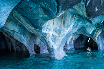 Natural landmark Marble Caves (Spanish: Cuevas de Marmol ) on General Carrera Lake in Chile, Patagonia, South America. - obrazy, fototapety, plakaty