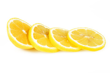 Sliced lemon round slices, white background, close-up.