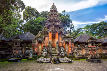 Ancient hindu temple at the Monkey Forest Sanctuary in Ubud, Bali, Indonesia. - obrazy, fototapety, plakaty