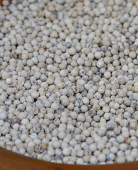 Mixed peppercorns background. Different colored peppercorns, close up.