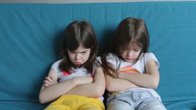 older and younger sisters are offended by each other, behavior and relationships of children in the family, concept