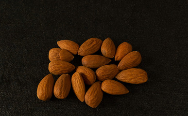 almonds on a black background