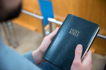 man hand Holy Bible
