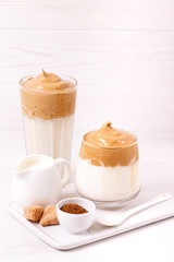 whipped dalgona coffee with milk and cane sugar. South Korean summer drink