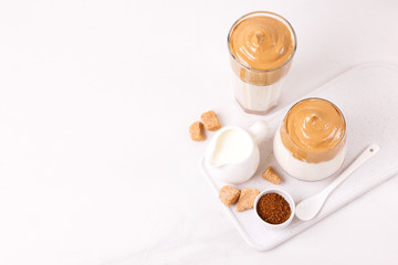whipped dalgona coffee with milk and cane sugar. South Korean summer drink