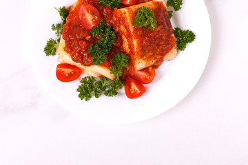 traditional Mexican cuisine chimichanga. Corn cake with minced meat, pepper, onion, garlic, oregano and marinara sauce