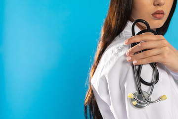 Stethoscope held on the arm by a young doctor from a pulmonary outpatient clinic.