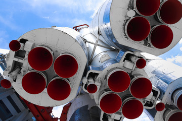 space rocket engine nozzles blue sky background