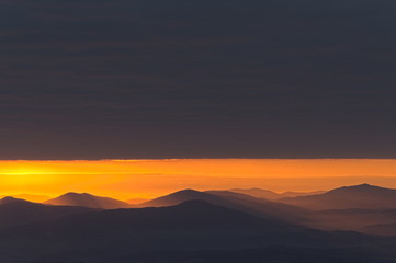 Red sunrise in the mountains. Babia Gora Poland.