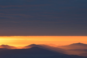 Red sunrise in the mountains. Babia Gora Poland.