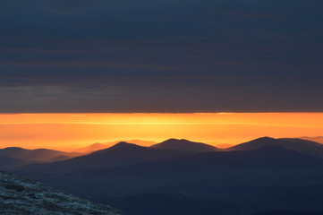 Fototapeta na wymiar Red sunrise in the mountains. Babia Gora Poland.