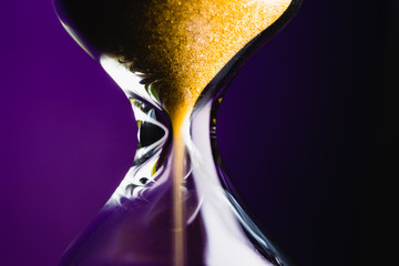  Hourglass withe gold sand close-up