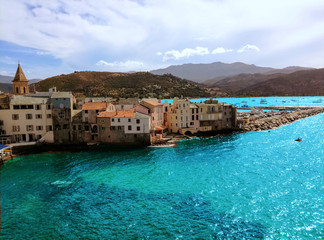 city of Saint Florent in Corsica, France. mountain town overlooking the mediterranean sea