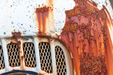 Obraz na płótnie Canvas Rusted panel on an old car