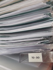 Large Stack of Files Labelled 