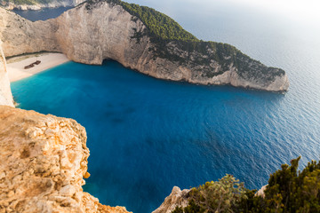 Idyllic view of the beautiful Navagio beach on the island of Zakynthos in Greece. the cliffs are of white rock, the water of the sea a deep blue and the beach of white sand