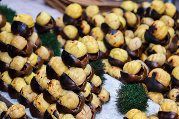 Roasting chestnuts on a street stall in Istanbul, Turkey. Selective focus.