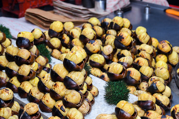 Roasting chestnuts on a street stall in Istanbul, Turkey. Selective focus.
