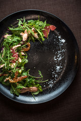 Chicken and green lettuce and leaf salad